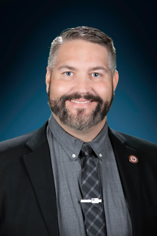 Rep. Justin Heap headshot